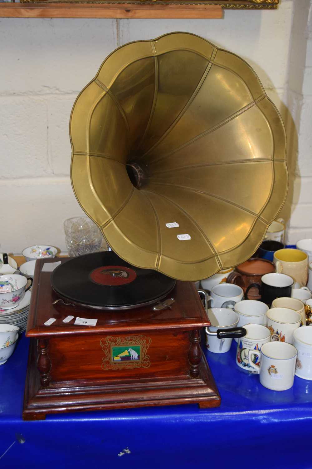 An old style gramophone player with metal horn