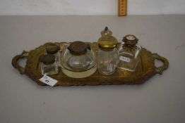 Metal tray containing a quantity of metal ink wells and jars