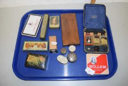 Tray containing various vintage boxes