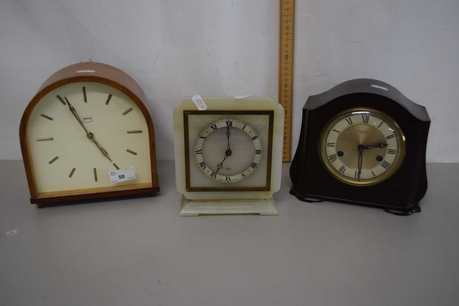 A Smiths mid 20th Century mantel clock with key together with a further Smiths Enfield Art Deco