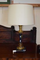 A good quality brass mounted table lamp