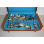 Wooden box containing a quantity of plated cutlery