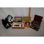 Quantity of boxed modern wristwatches and writing sets