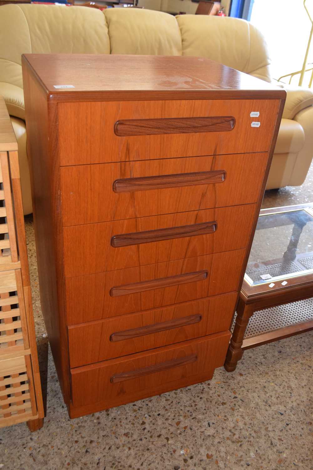 A teak finish late 20th Century chest of six drawers, width approx 56cm