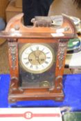 Late Victorian mantel clock with Roman numeral dial complete with pendulum and key