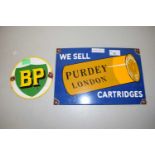 An enamel sign for Purdy Cartridges together with a circular BP sign
