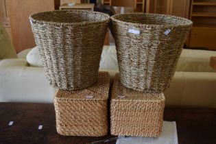 Two waste paper baskets and two storage baskets