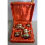 A cased plated coffee set