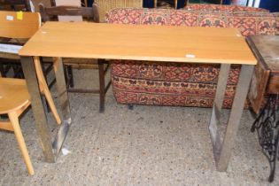 A modern chrome framed side table, length approx 110cm