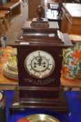 A Victorian mantel clock in mahogany case
