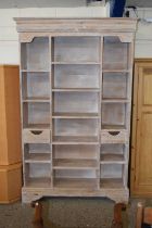 A limed oak wall unit, width approx 121cm