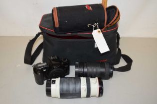 A camera case including a Canon EOS500 camera with Sigma lens and other accessories