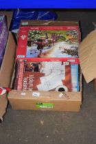 Box of various jigsaw puzzles etc