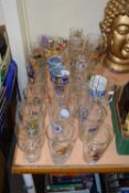 Quantity of various branded pint and other glass ware