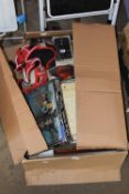 Box containing various sundries including picture frames, mobile phone cases etc