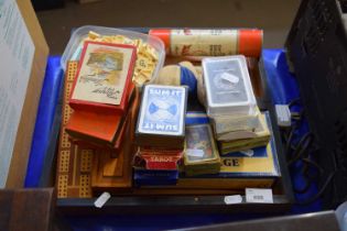 Box containing a quantity of various card games, Scrabble tiles etc