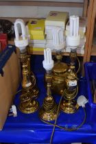 Five various brass lamp bases