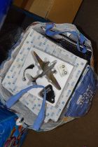 Bag containing a quantity of Atlas models of aeroplanes