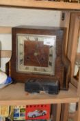 Oak cased mantel clock together with a small transistor radio