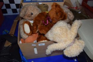 Box containing various soft toys