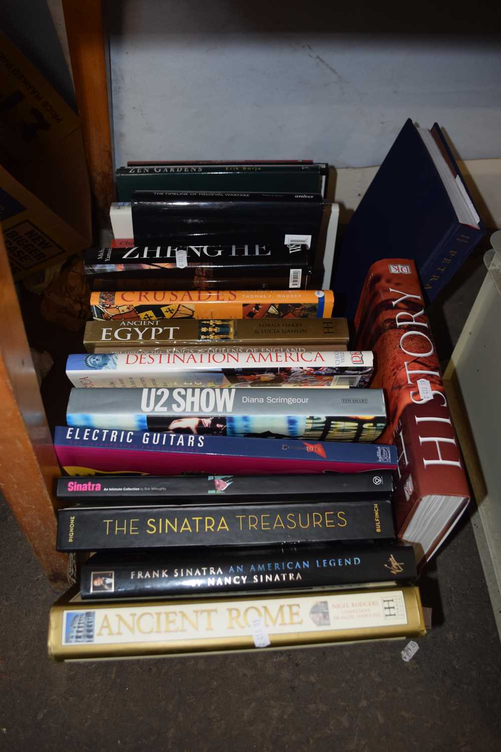 Box containing a quantity of hard back reference books including music interest Sinatra, U2 ,