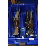 Cutlery tray containing quantity of cutlery