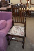 An upholstered oak hall chair