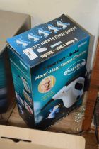 Boxed hand held steam cleaner