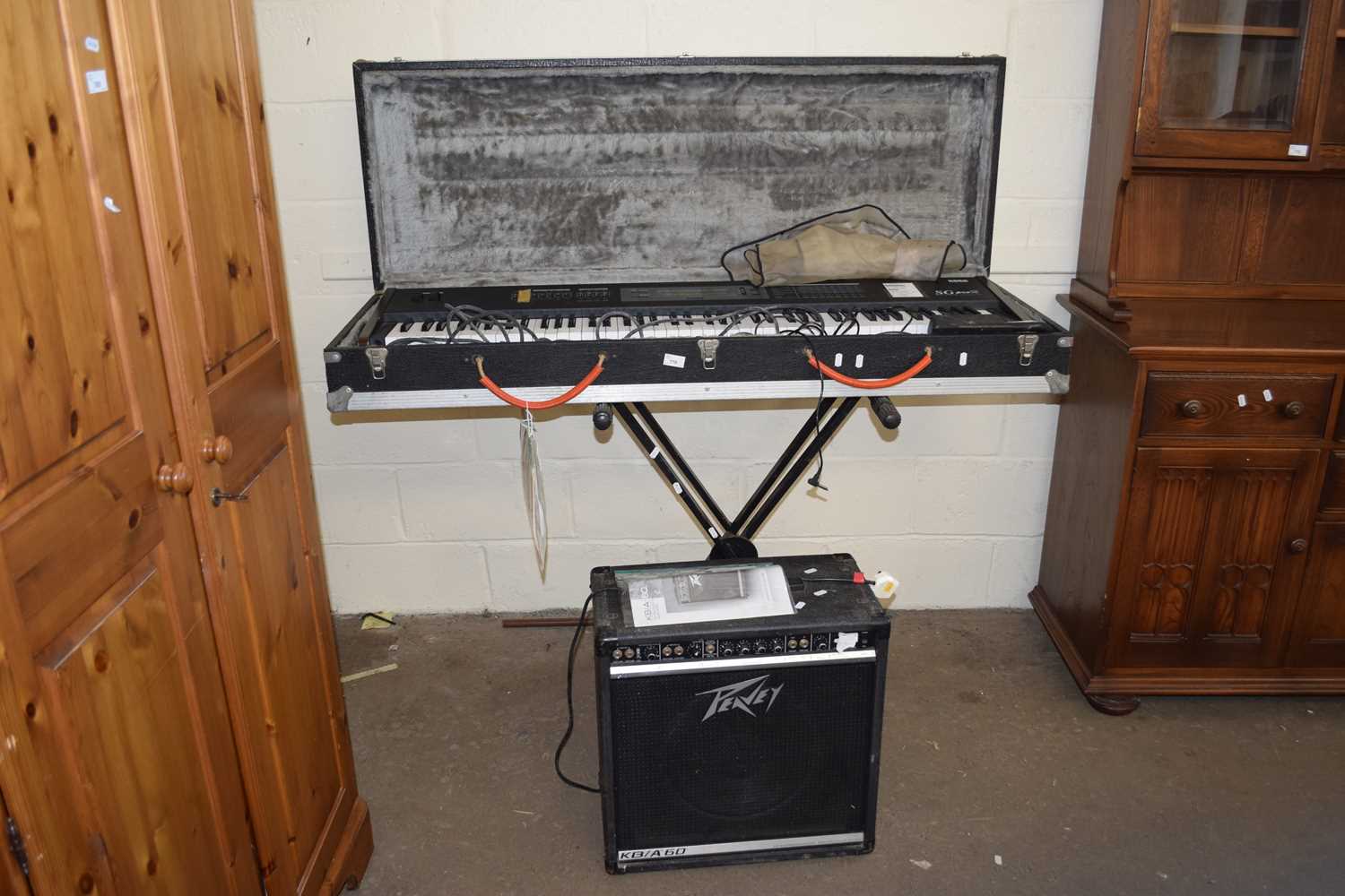 A Korg SG Pro-X stage piano, in case with stand