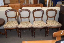 Set of four upholstered balloon back dining chairs