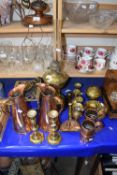 A selection of miscellaneous copper ware including trivet, jugs, oil lamp etc
