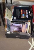 Box containing various books including National Geographic volumes, various other travel interest