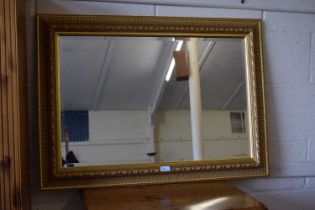 Modern gilt framed bevelled edged mirror