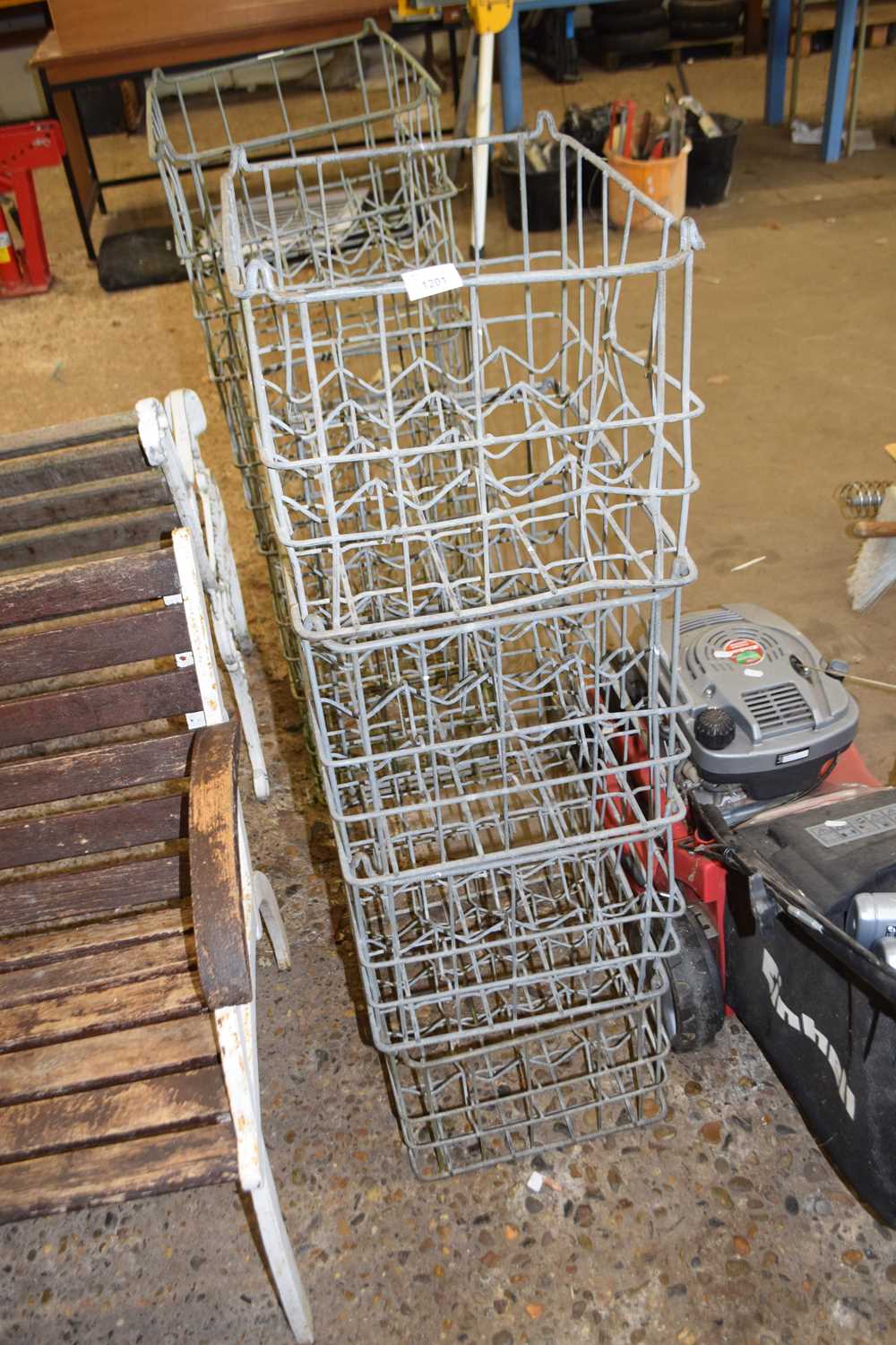 Four galvanised milk crates