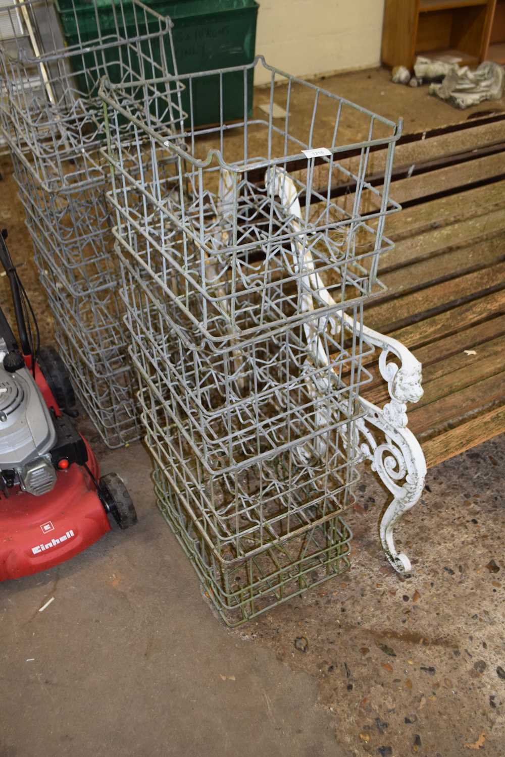 Four galvanised milk crates