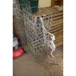 Four galvanised milk crates