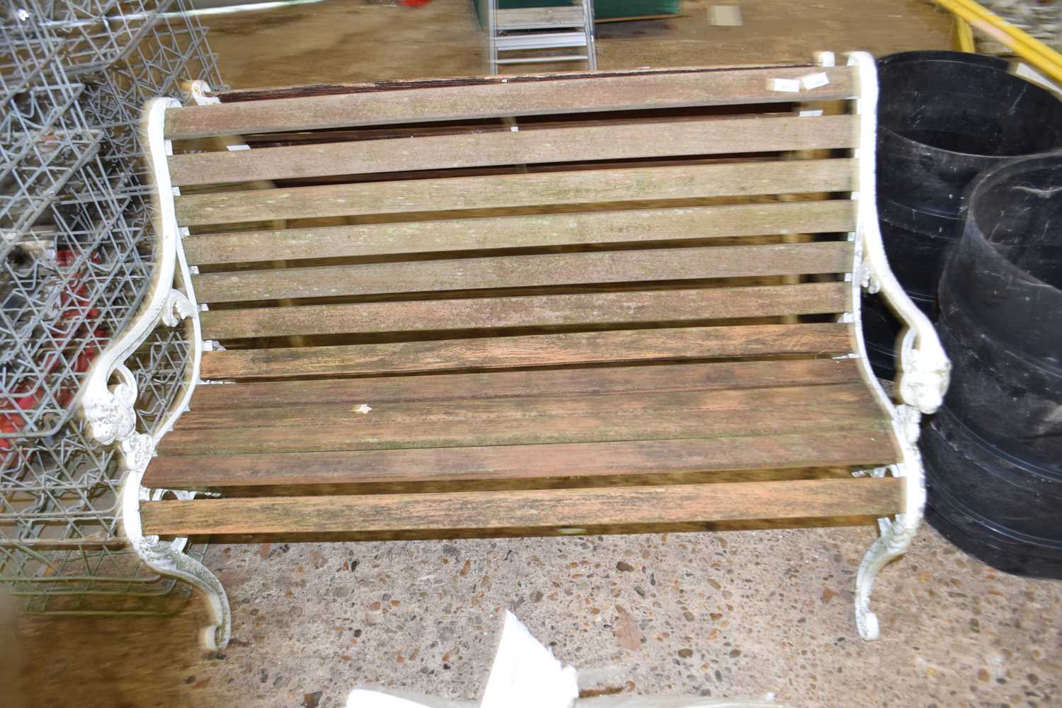 Garden bench with decorative cast iron ends