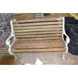 Garden bench with decorative cast iron ends