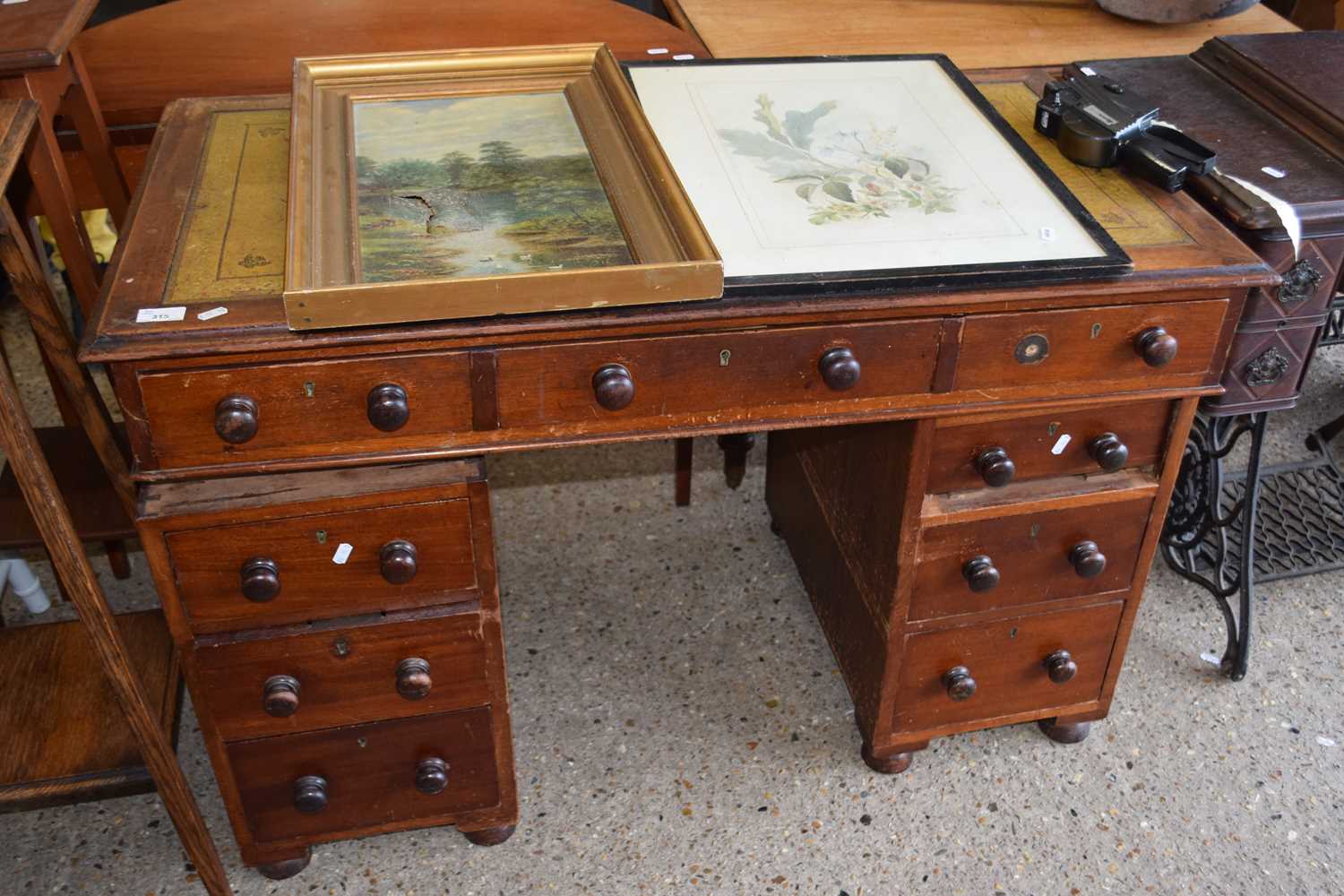 A late 19th Century twin pedestal office desk with leather writing surface