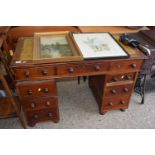 A late 19th Century twin pedestal office desk with leather writing surface