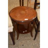 An Edwardian circular two tier occasional table