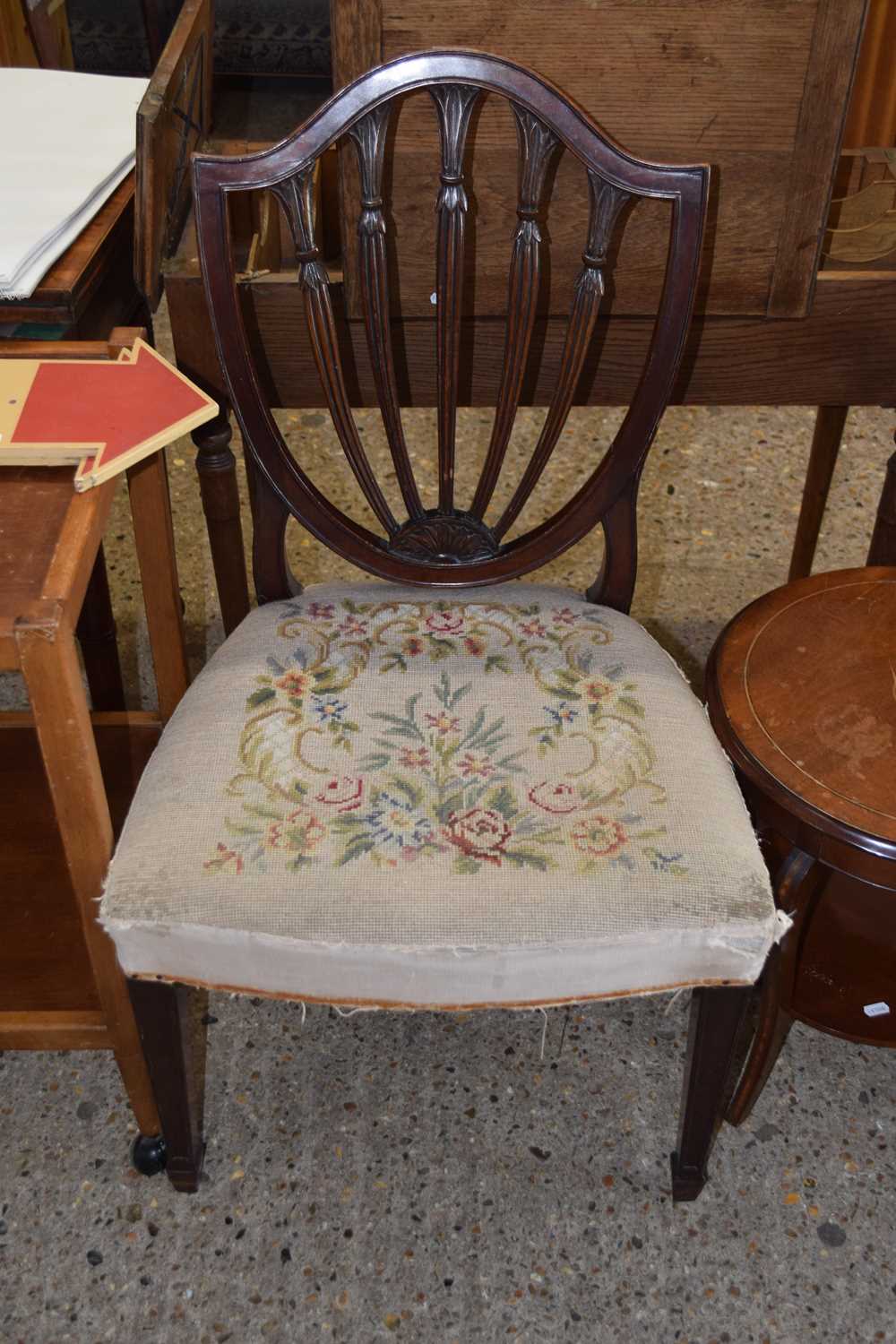 A Georgian shield back dining chair with tapestry seat