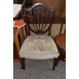 A Georgian shield back dining chair with tapestry seat