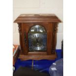 A 20th Century oak cased mantel clock