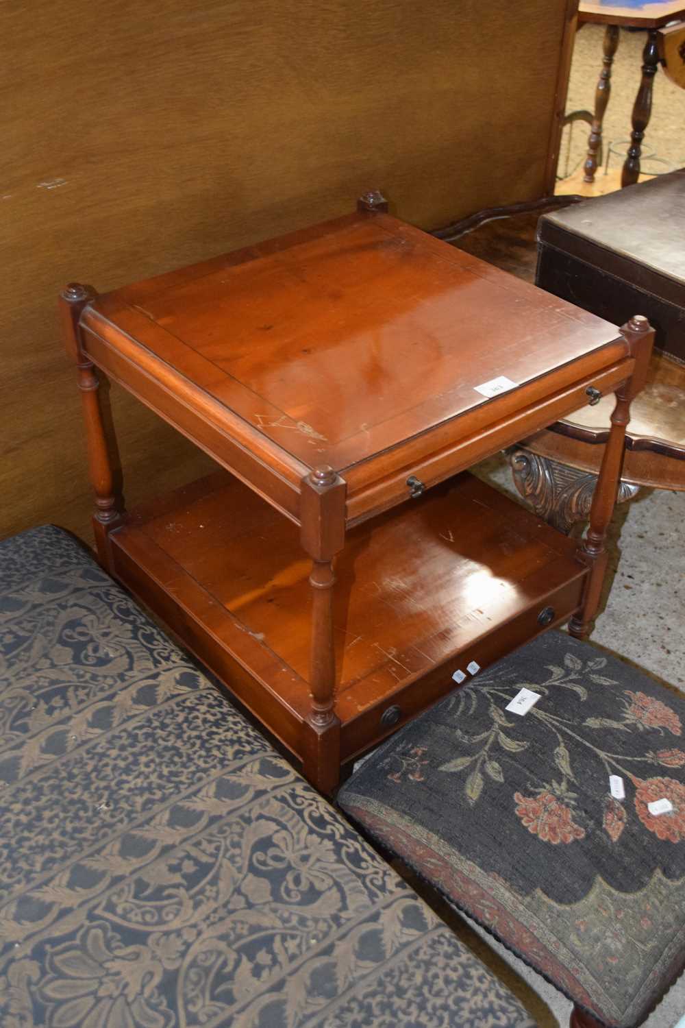 A reproduction yew wood veneered bedside cabinet with pull out slide