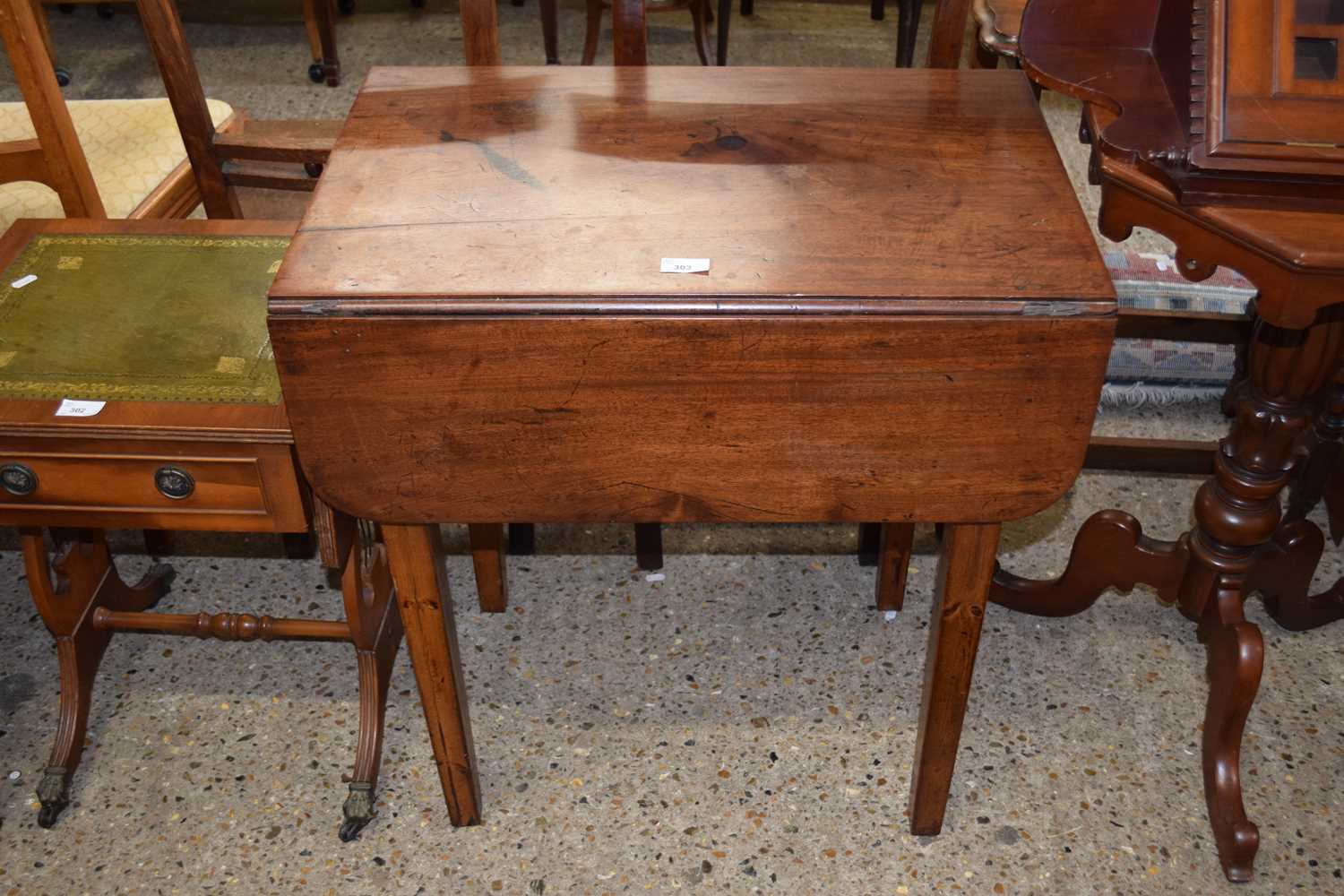 A small Victorian mahogany drop leaf table