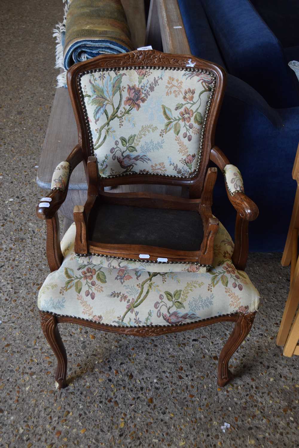 Continental style floral upholstered chair and matching footstool