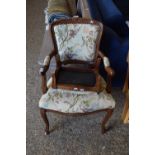 Continental style floral upholstered chair and matching footstool