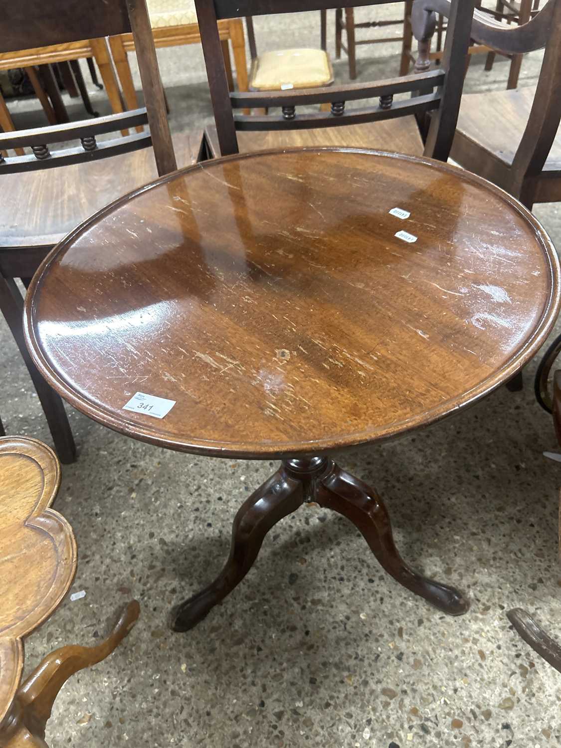 A reproduction Georgian style mahogany table with circular top and tripod base