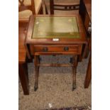 A reproduction leather topped drop leaf lamp table